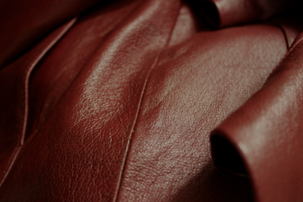 a close up of a red leather material